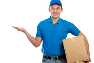 portrait of smiling delivery man with package on white background